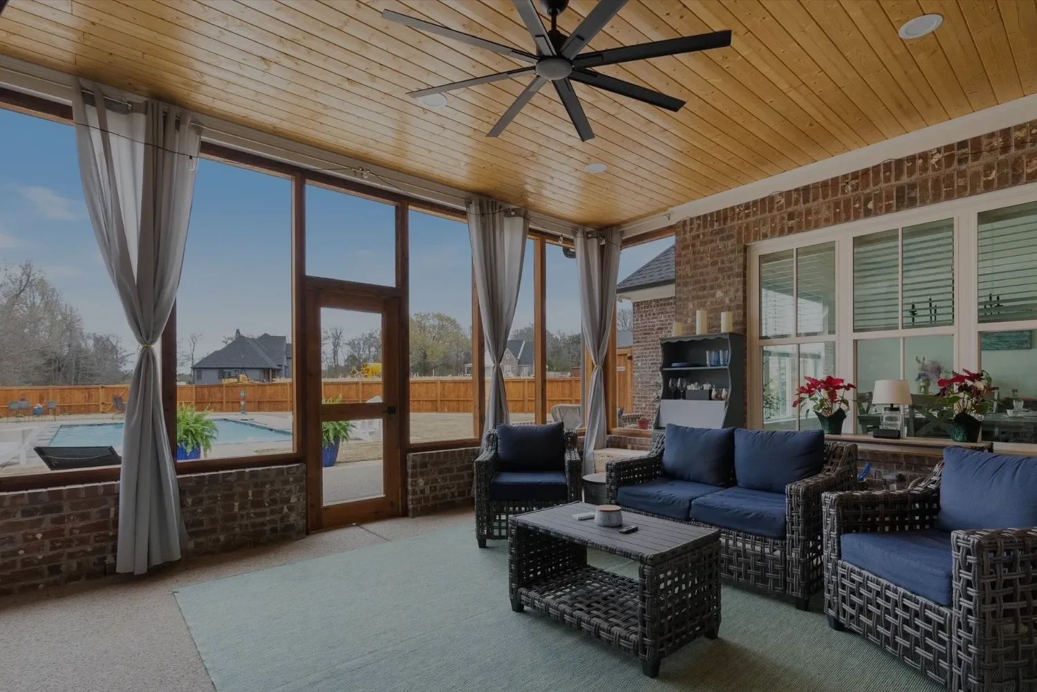Custom screen porch with ceader beams.