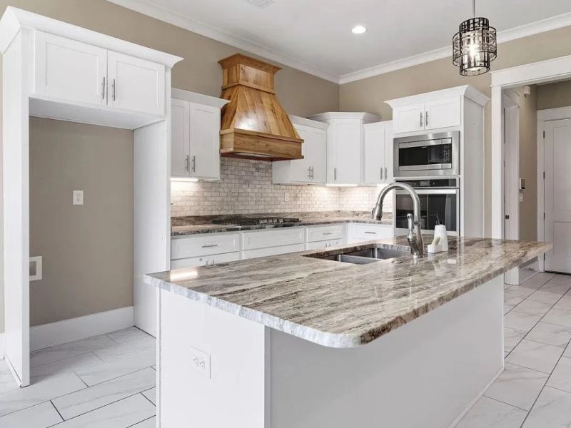 Cutom kitchen with quartz island.