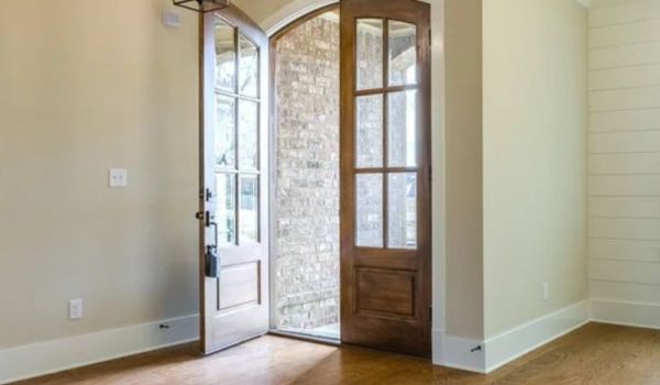 Home entry featuring custom solid oak doors.